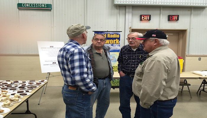 Farm Bureau members discussing issues during expo.